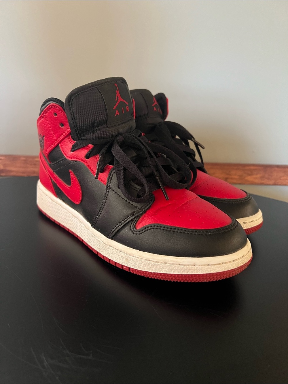 Nike Air Jordan’s red and black